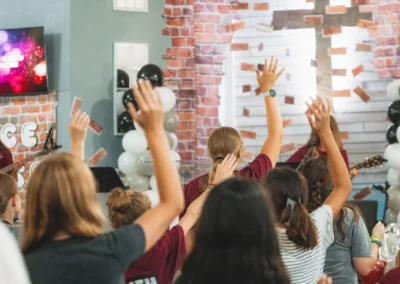 Youth worshiping at God’s Graffiti Youth Conference in Sparta, TN