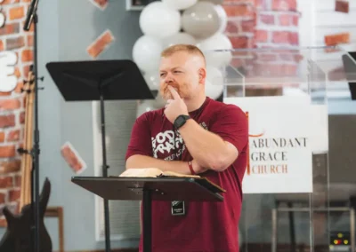 Pastor Caleb Andrews speaking at God’s Graffiti Youth Conference